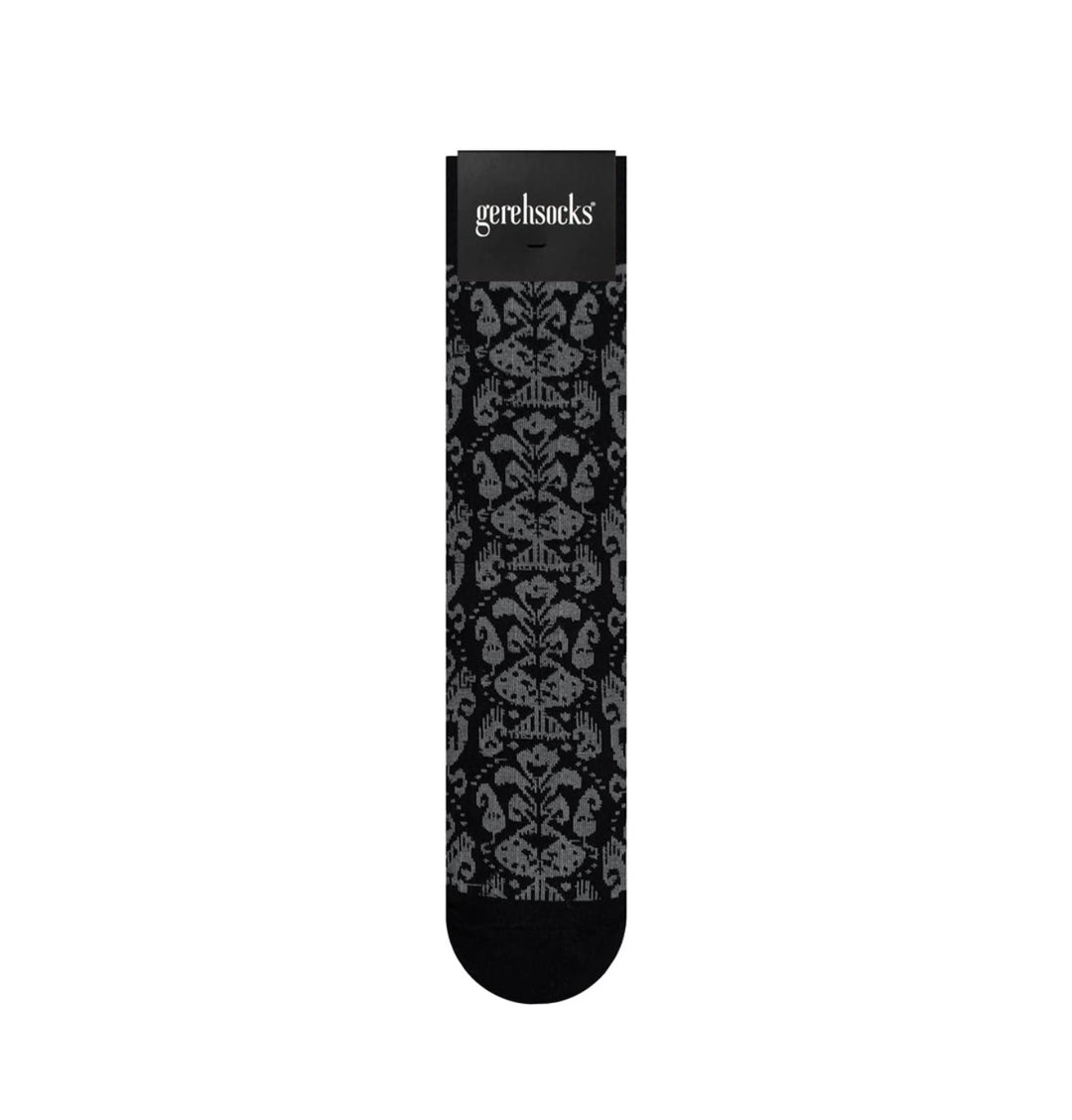 A single black crew sock with a gray damask pattern and a black cuff featuring the brand name 'gerehsocks' in white, shown against a plain white background.