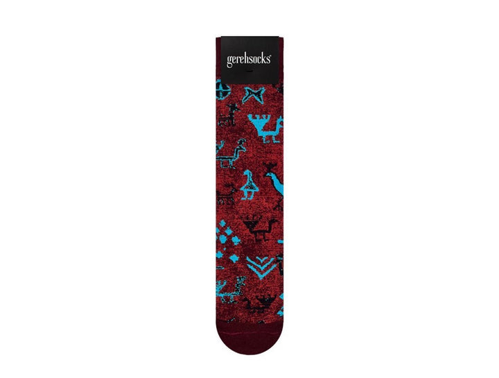 A single Gentsocks sock with a red background featuring a light blue and black geometric and animal pattern, shown against a plain white background.