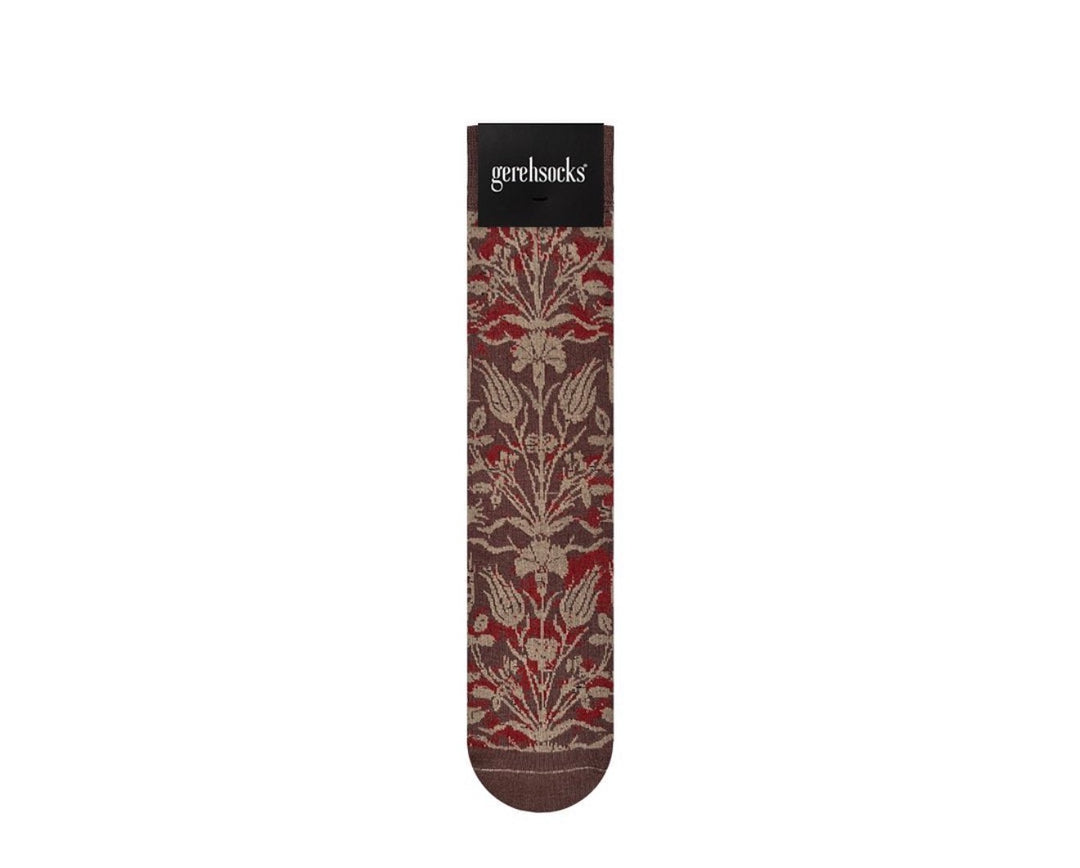 A single sock with an intricate floral damask pattern in red, brown, and beige, featuring a solid black cuff with the brand name 'gentlelifestyle' printed in white.